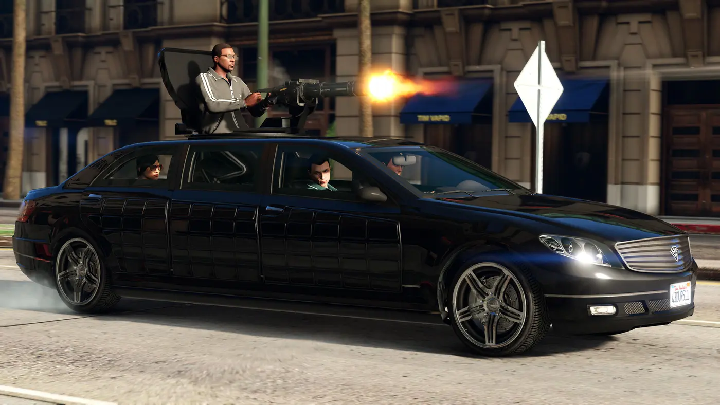 Capture officielle de GTA V : une limousine noire blindée équipée d'une minigun sur le toit, actionnée par un tireur, ouvre le feu dans une rue de Los Santos