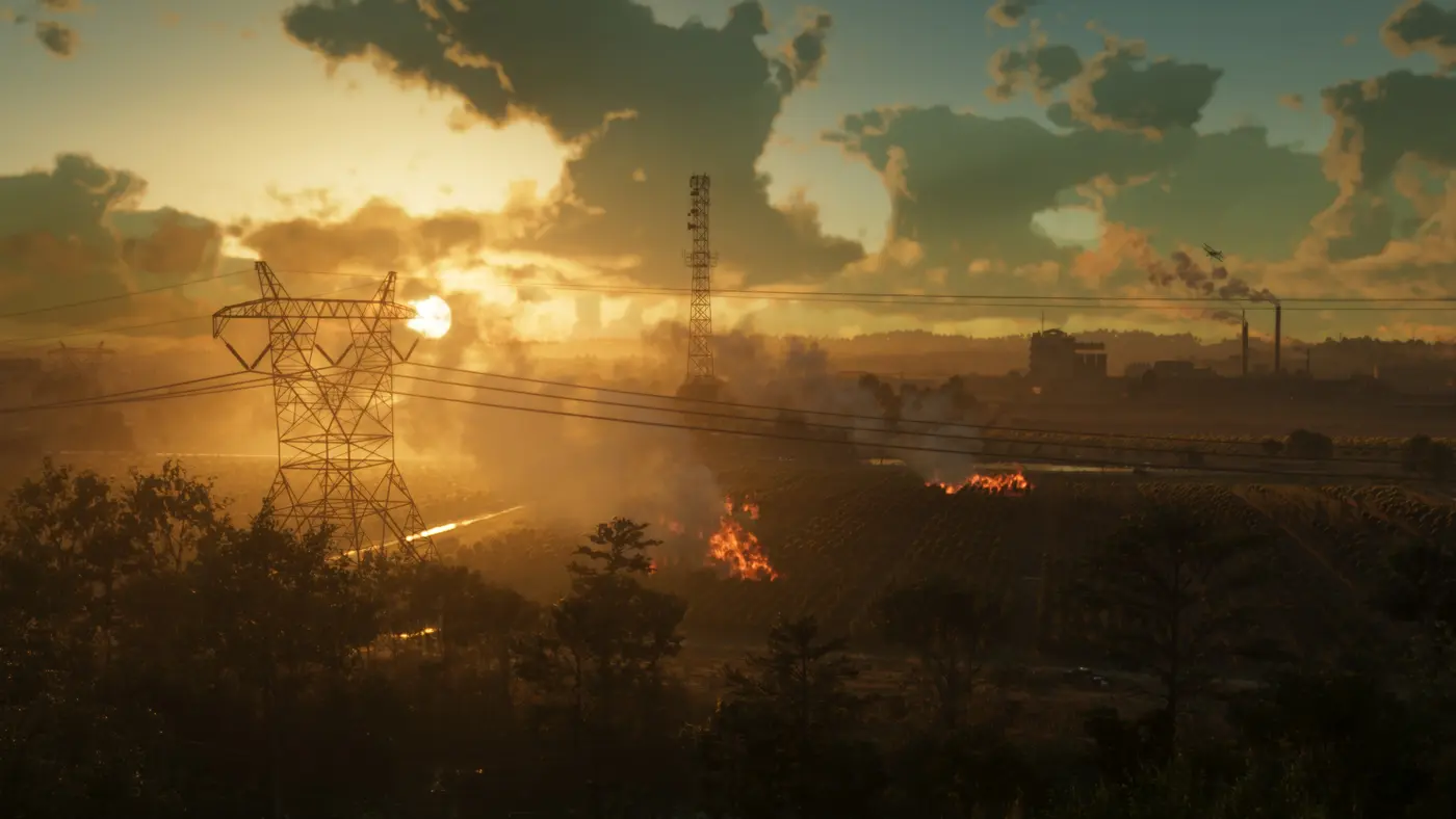 Coucher de soleil doré sur des terres agricoles de la région d'Ambrosia : pylône électrique, antenne, fumée et un feu de champ au loin dans GTA VI